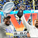 Von Miller, left, of the Los Angeles Rams as in cured teammate Robert Woods holds up the Lombardi trophy after the Rams defeat the Cincinnati Bengals 23-20 in an NFL Super Bowl LVI football game at SoFi Stadium in Inglewood, on Sunday, February 13, 2022.